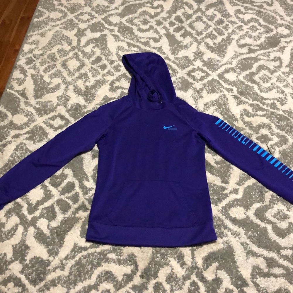 A purple and blue Nike sweatshirt